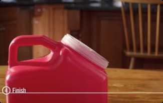 SHARPS DISPOSAL CONTAINER ON TABLE SHARPS DISPOSAL CONTAINER ON TABLE