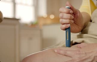 WOMAN IS INJECTING HERSELF